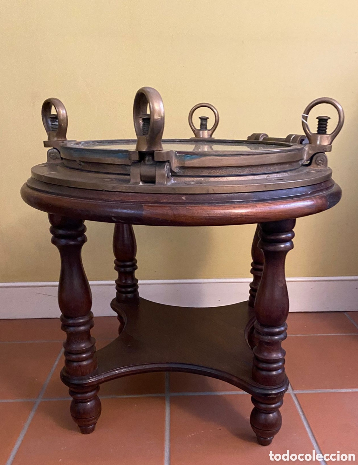 Antig&uuml;edades: Mesa Auxiliar Ojo de Buey Bronce - Foto 1