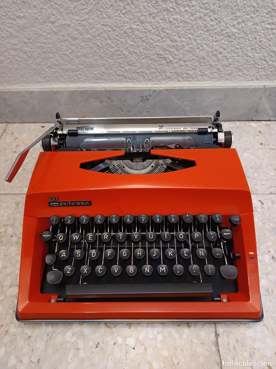 Antig&uuml;edades: M&aacute;quina de escribir Triumph Contessa de Luxe naranja con malet&iacute;n &ndash; A&ntilde;os 70 &ndash; Funcionando