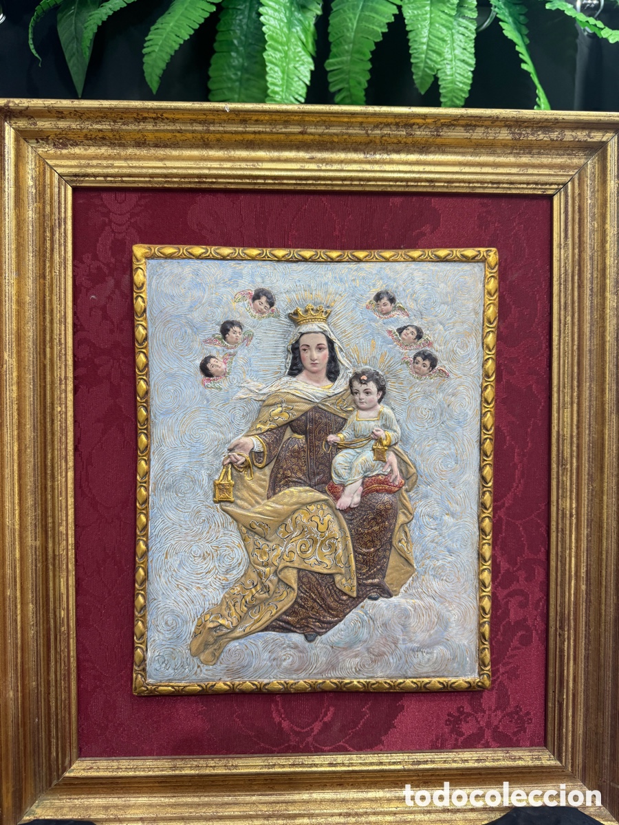 Antig&uuml;edades: Cuadro de terracota pintadas las nubes en oro fino.