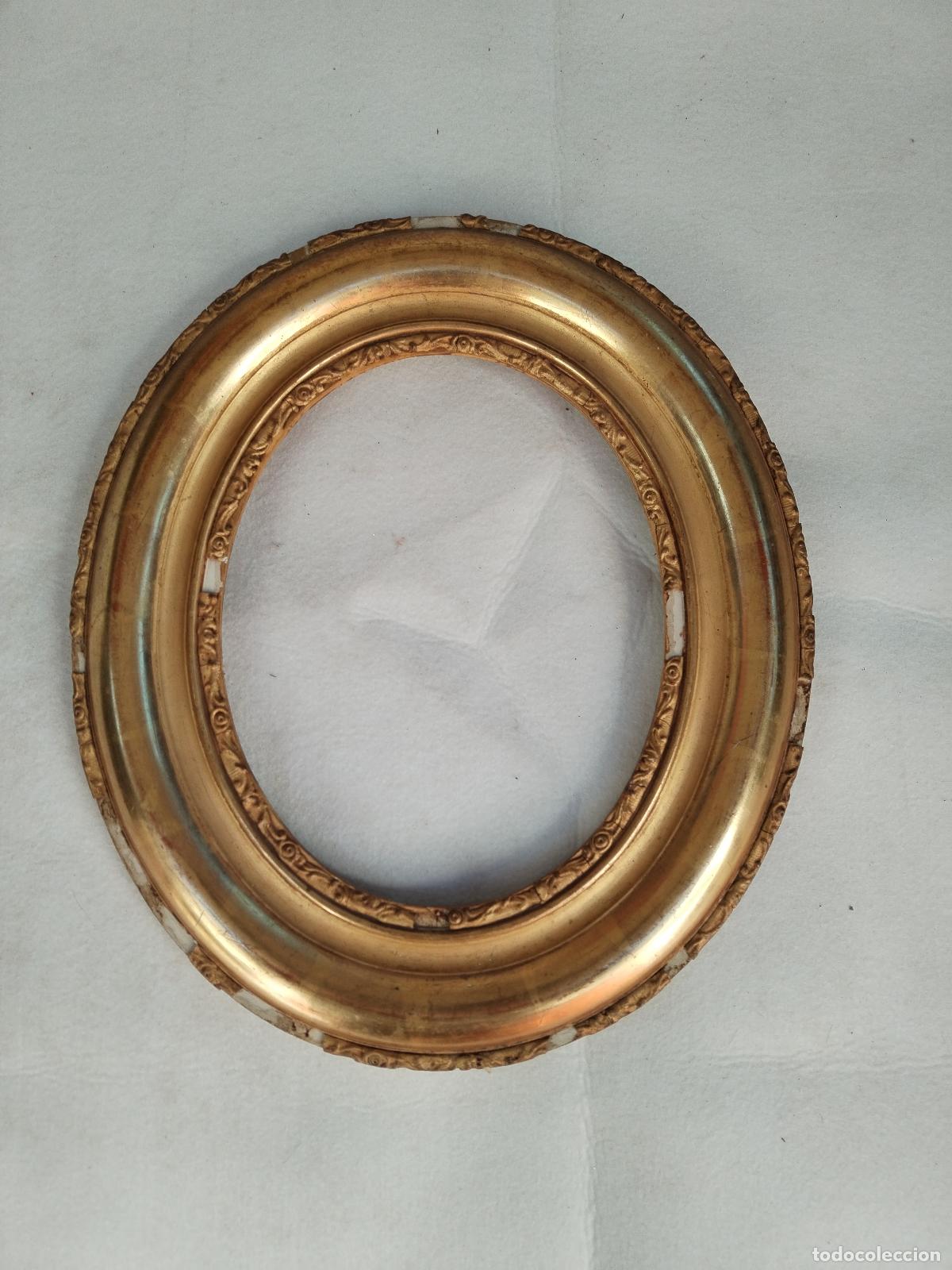 Antig&uuml;edades: marco de madera dorado ovalado - Foto 1