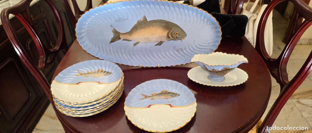 Oggetti Antichi: Servicio antiguo de pescado en porcelana, decorado con motivos naturalistas de peces y filos de oro