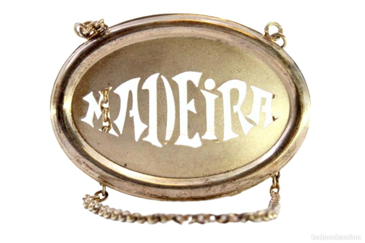 Antiquit&auml;ten: Etiqueta plateada para botella