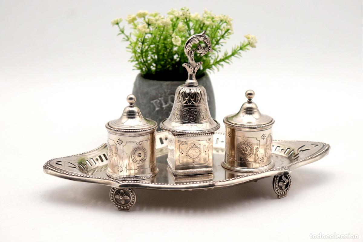 Antiques: tintero de plata