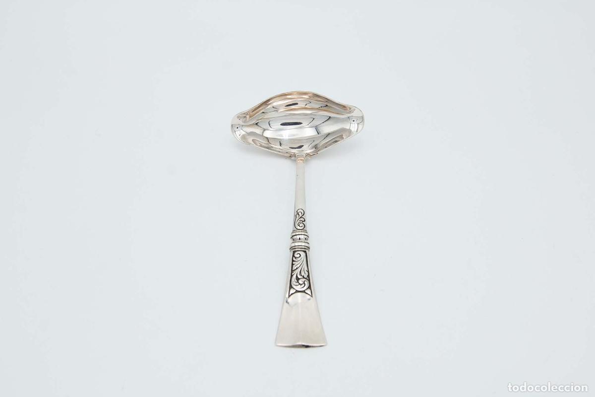 Antiques: Cuchara de salsa de plata
