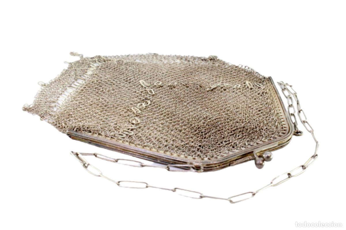 Antiguidades: bolsa de plata