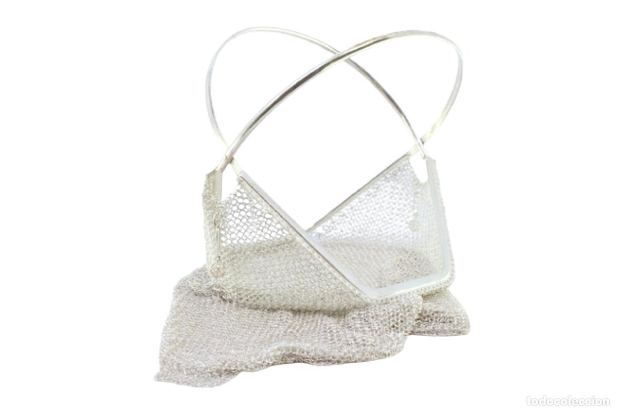 Antiques: bolsa de plata