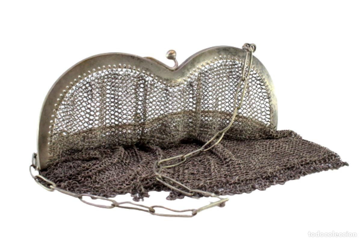Antiques: bolsa de plata