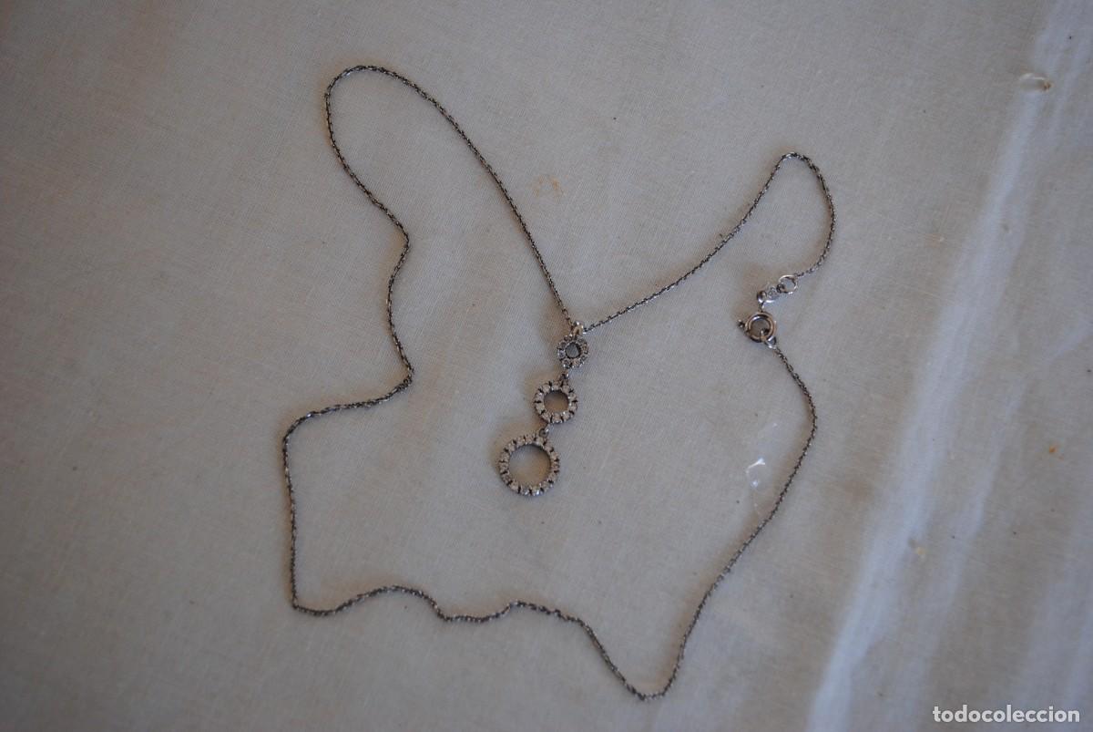 Antig&uuml;edades: COLGANTE EN FORMA DE AROS Y CADENA DE PLATA - Foto 1