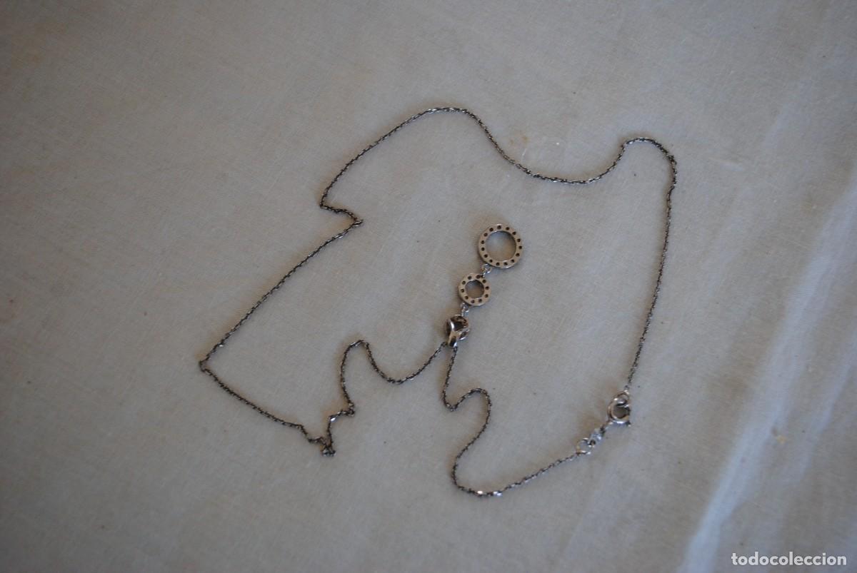 Antig&uuml;edades: COLGANTE EN FORMA DE AROS Y CADENA DE PLATA - Foto 2