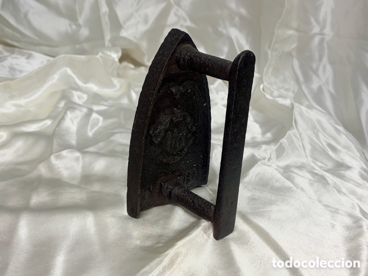 Antig&uuml;edades: Antigua plancha de hierro fundido