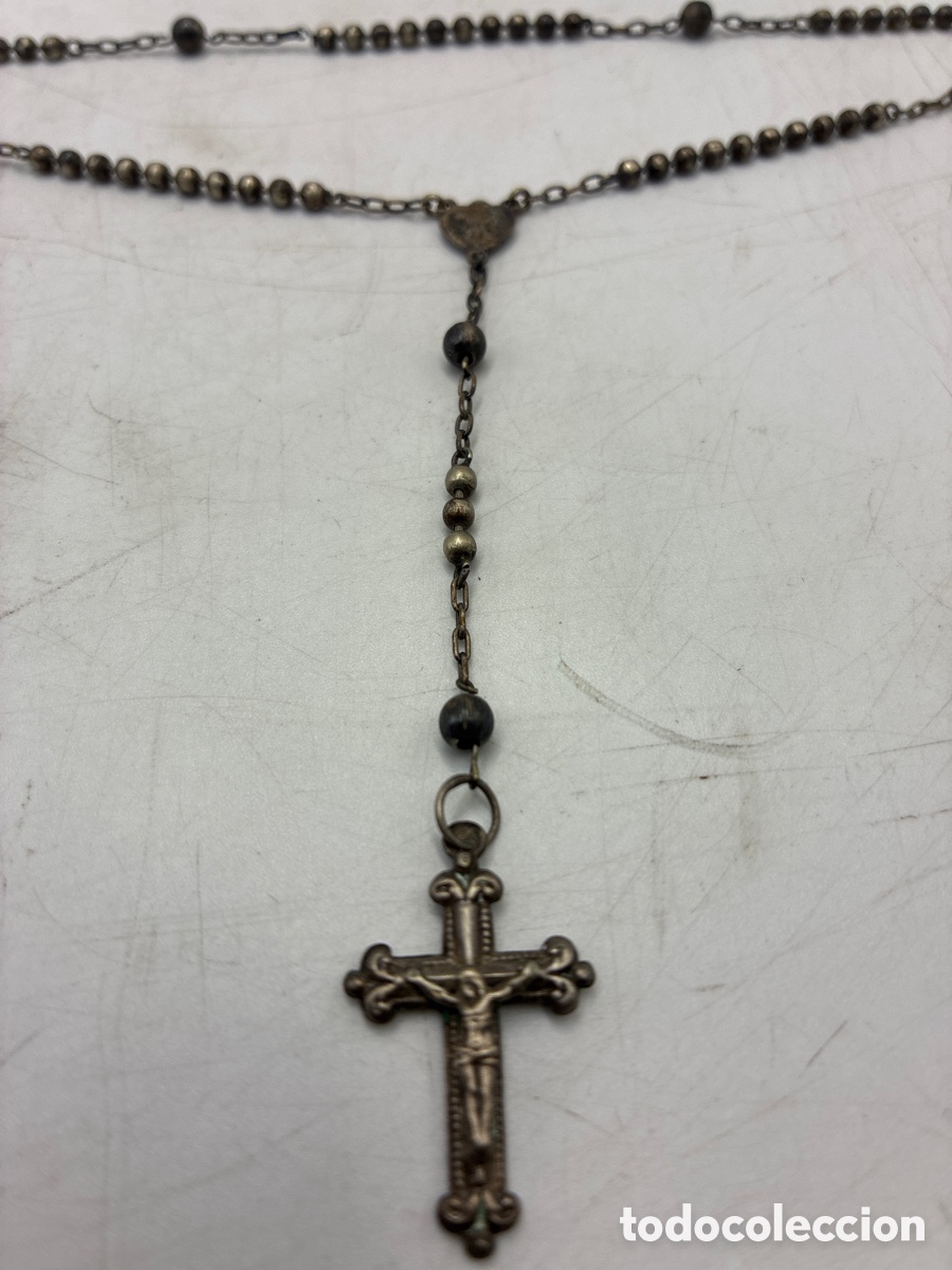 Antig&uuml;edades: Antiguo crucifijo plateado.