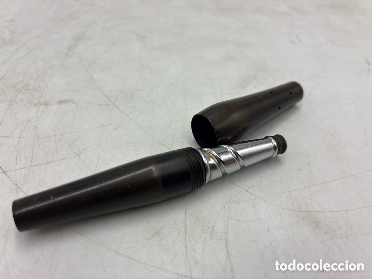 Antig&uuml;edades: Boquilla de baquelita plegable.