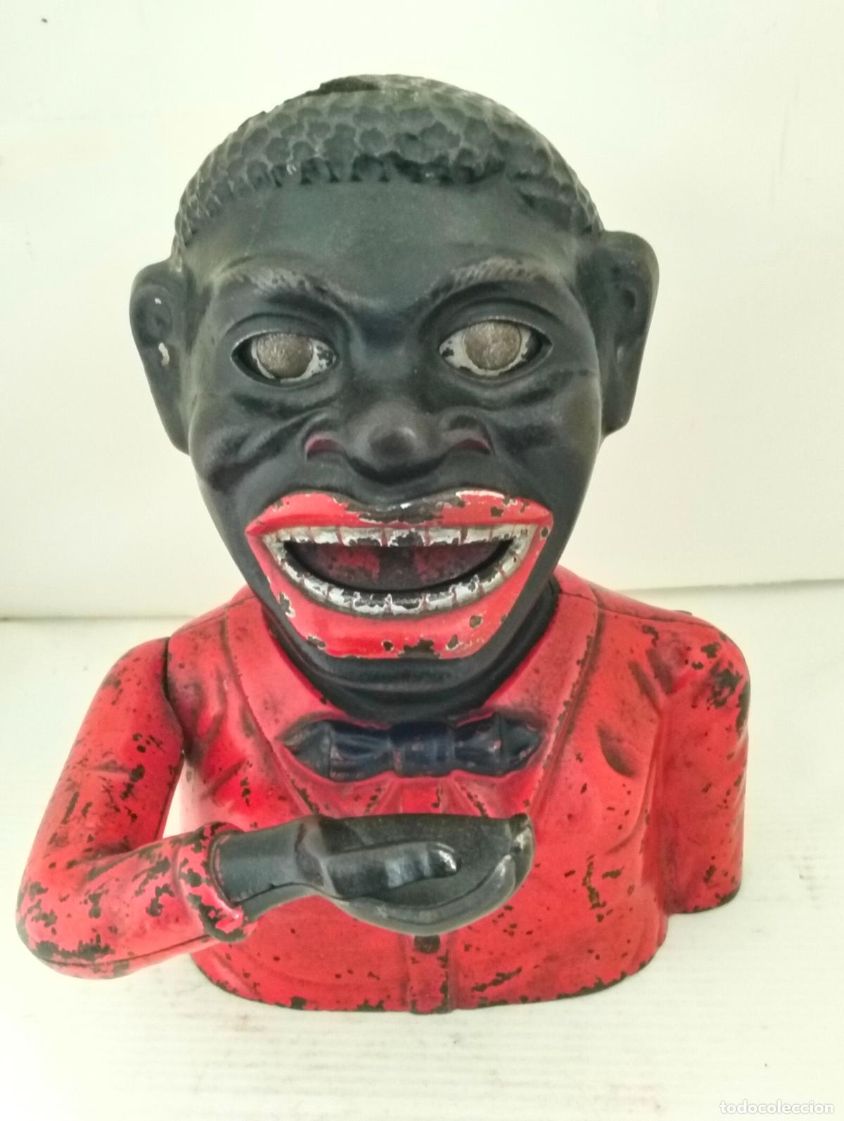 Antig&uuml;edades: HUCHA MECANICA ARTICULADA, JOLLY NIGGER BANK, BUFFALO N. Y. USA, HIERRO FUNDIDO, A&Ntilde;OS 20