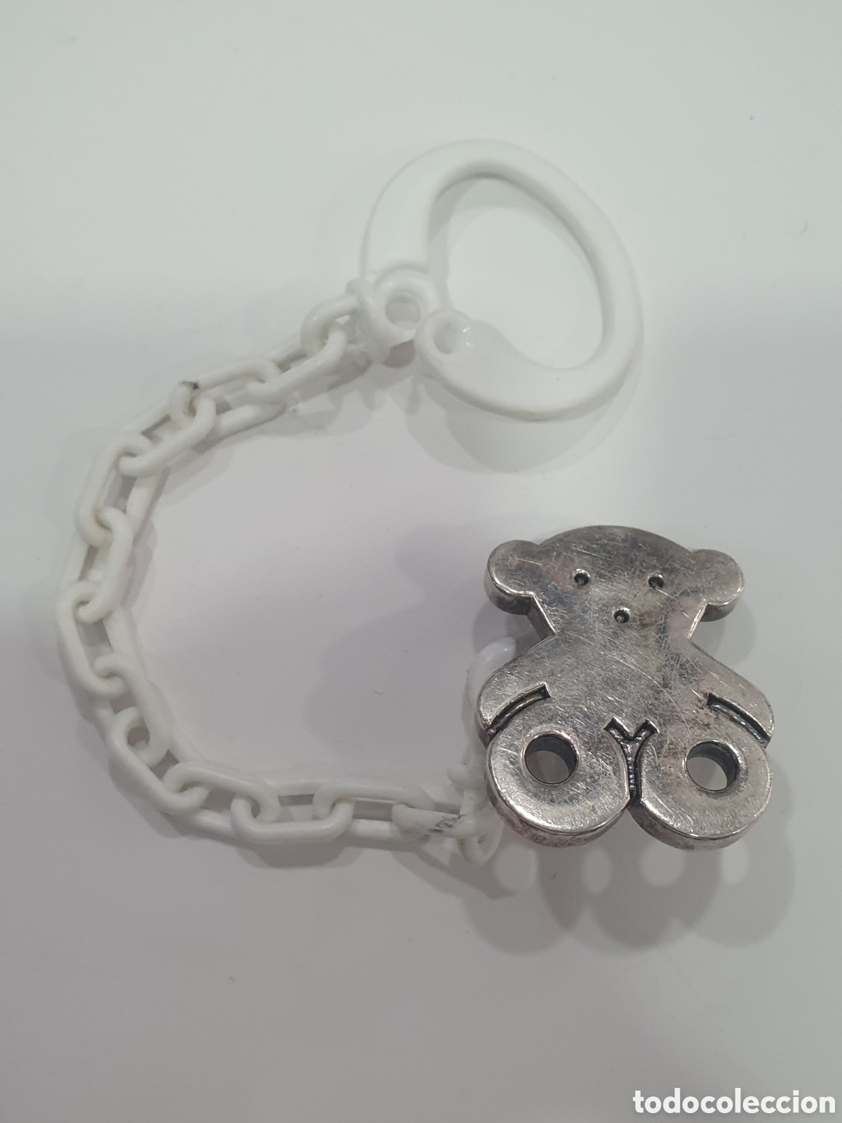 Antiques: Chupetero de Tous de plata. (L61)