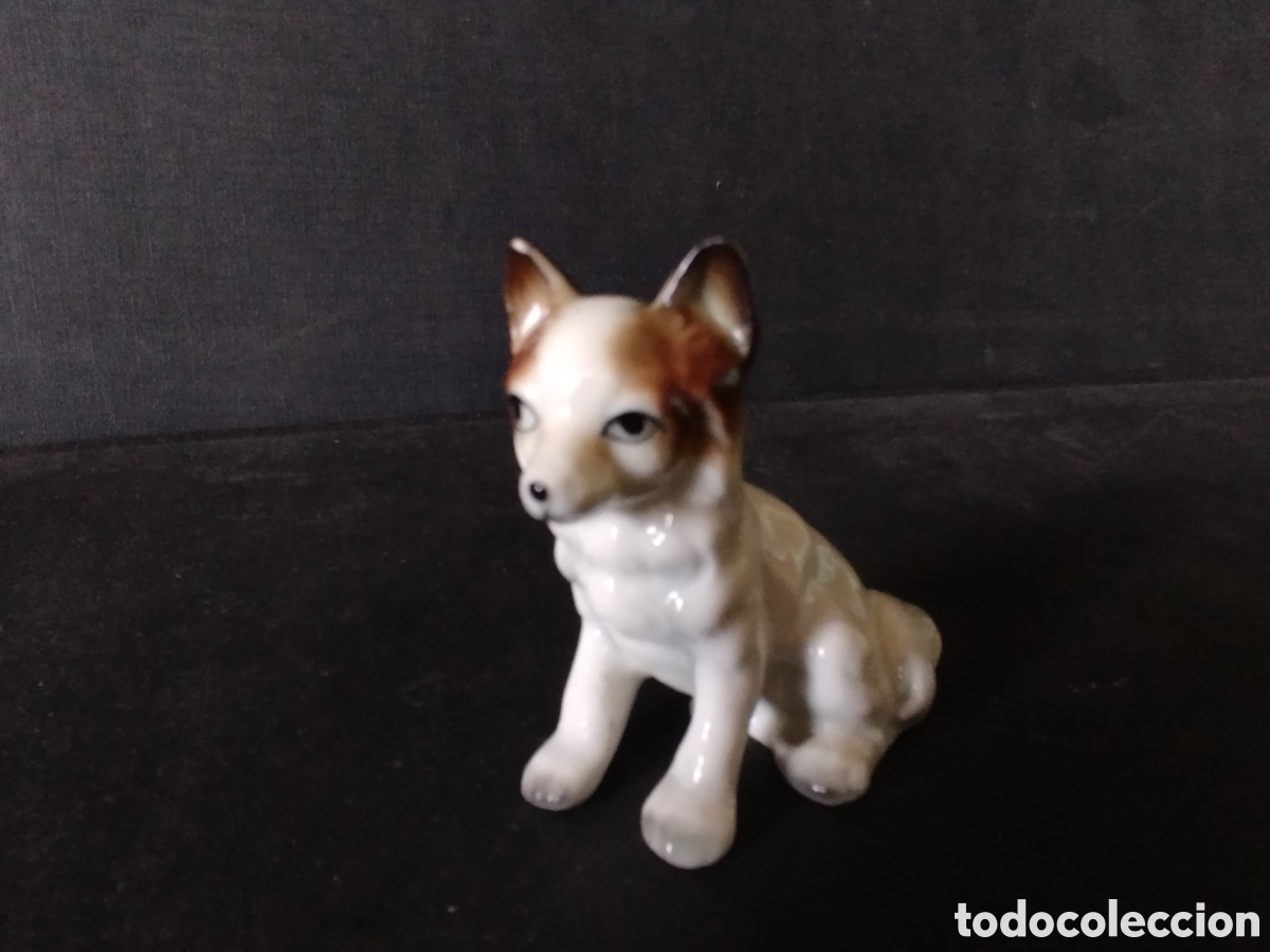 Antig&uuml;edades: PERRITO DE PORCELANA.