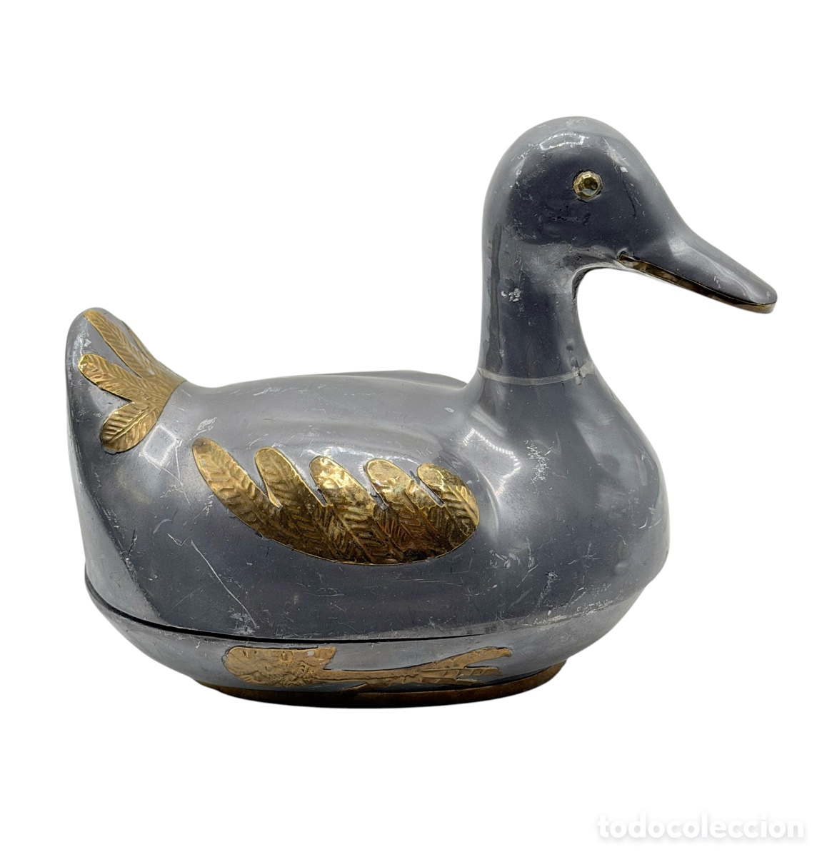 Antiquit&auml;ten: Antigua caja de Pato en Metal