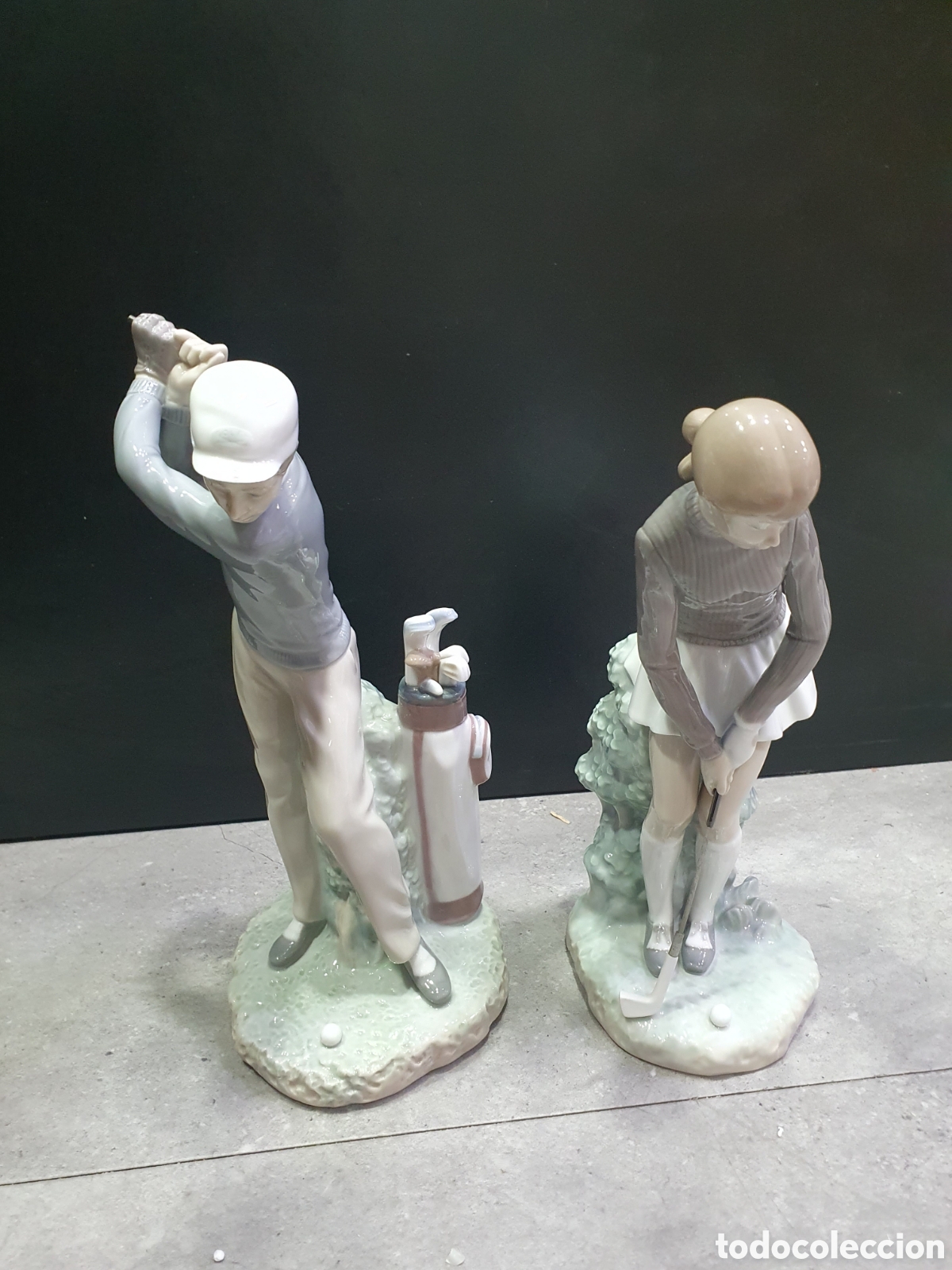 Antig&uuml;edades: SALIDA 0.01&euro;. Lladr&oacute; 4851 y 4824. Pareja de golfistas.