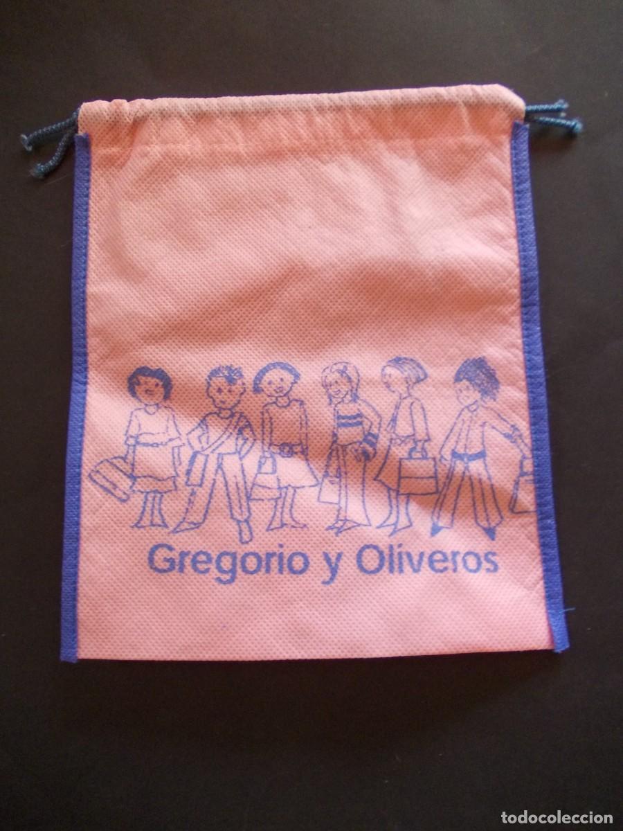 Antiguidades: Bolsa con cord&oacute;n Gregorio y Oliveros rosa y azul escolar Na&iacute;f Memorabilia Kitsch A&ntilde;os 80