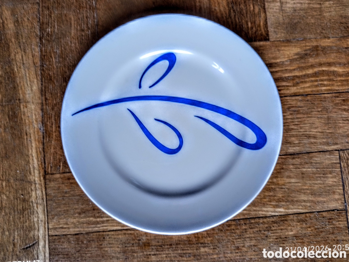 Antiquit&auml;ten: plato llano 21 cm. con dibujo azul marino