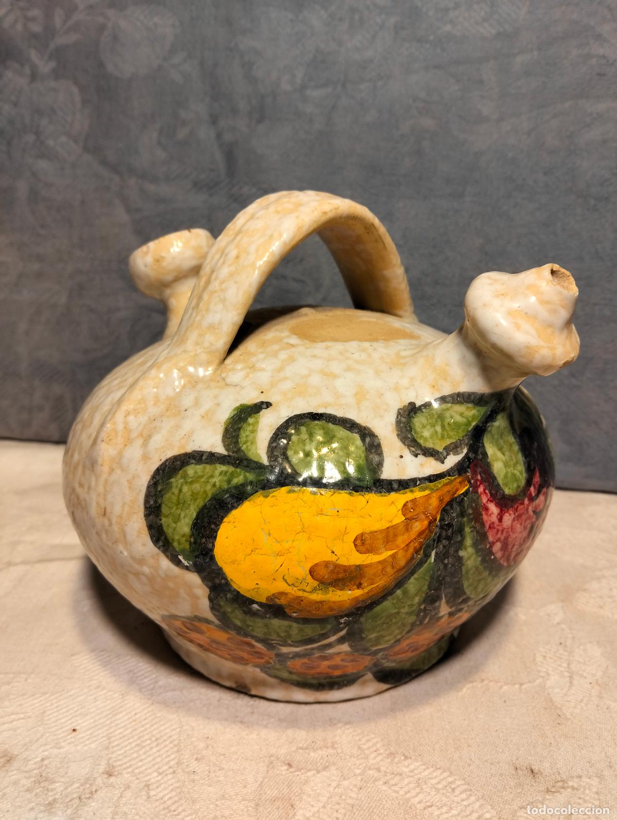 Antig&uuml;edades: Botijo de ceramica pintada a mano con flores del autor Pablo Sanguino Toledo a&ntilde;os 70-80