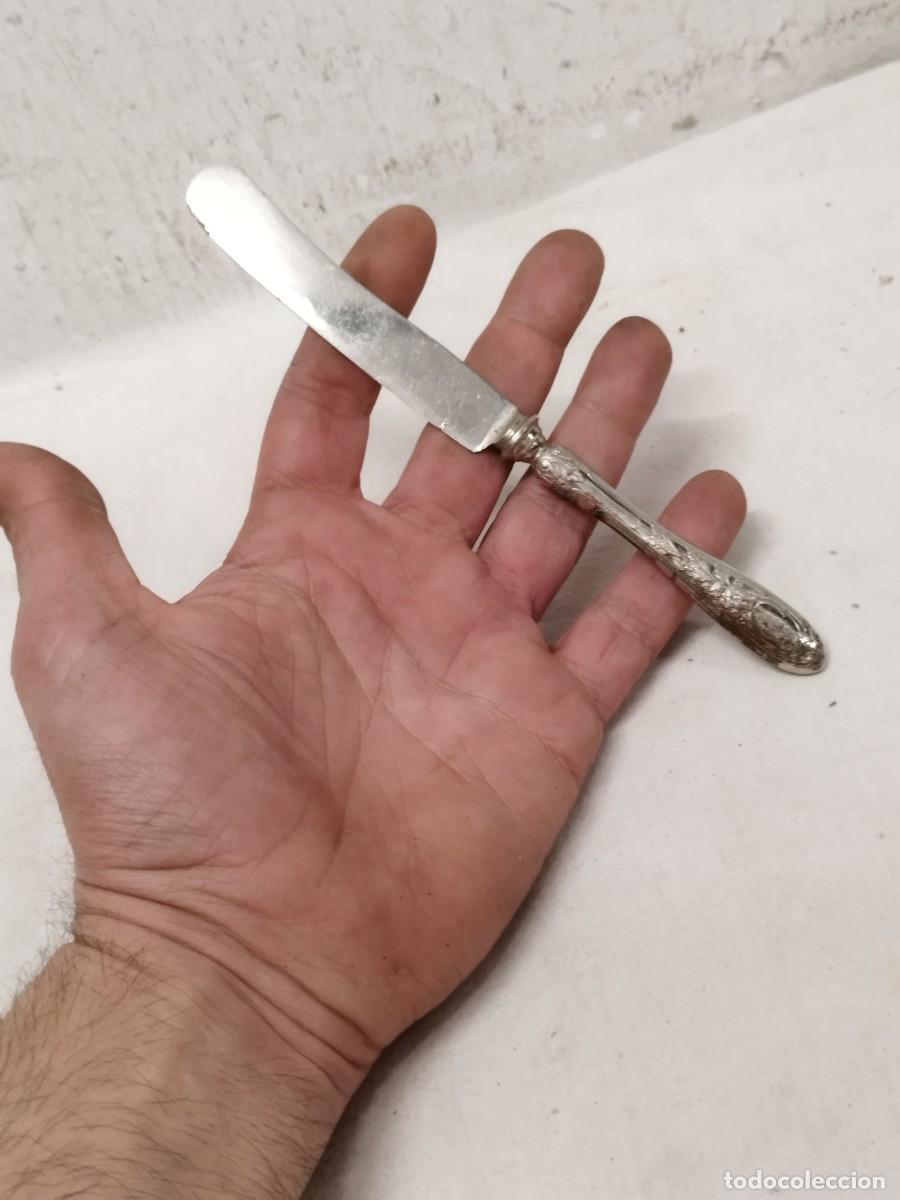 Antig&uuml;edades: Antiguo cuchillo plateado.