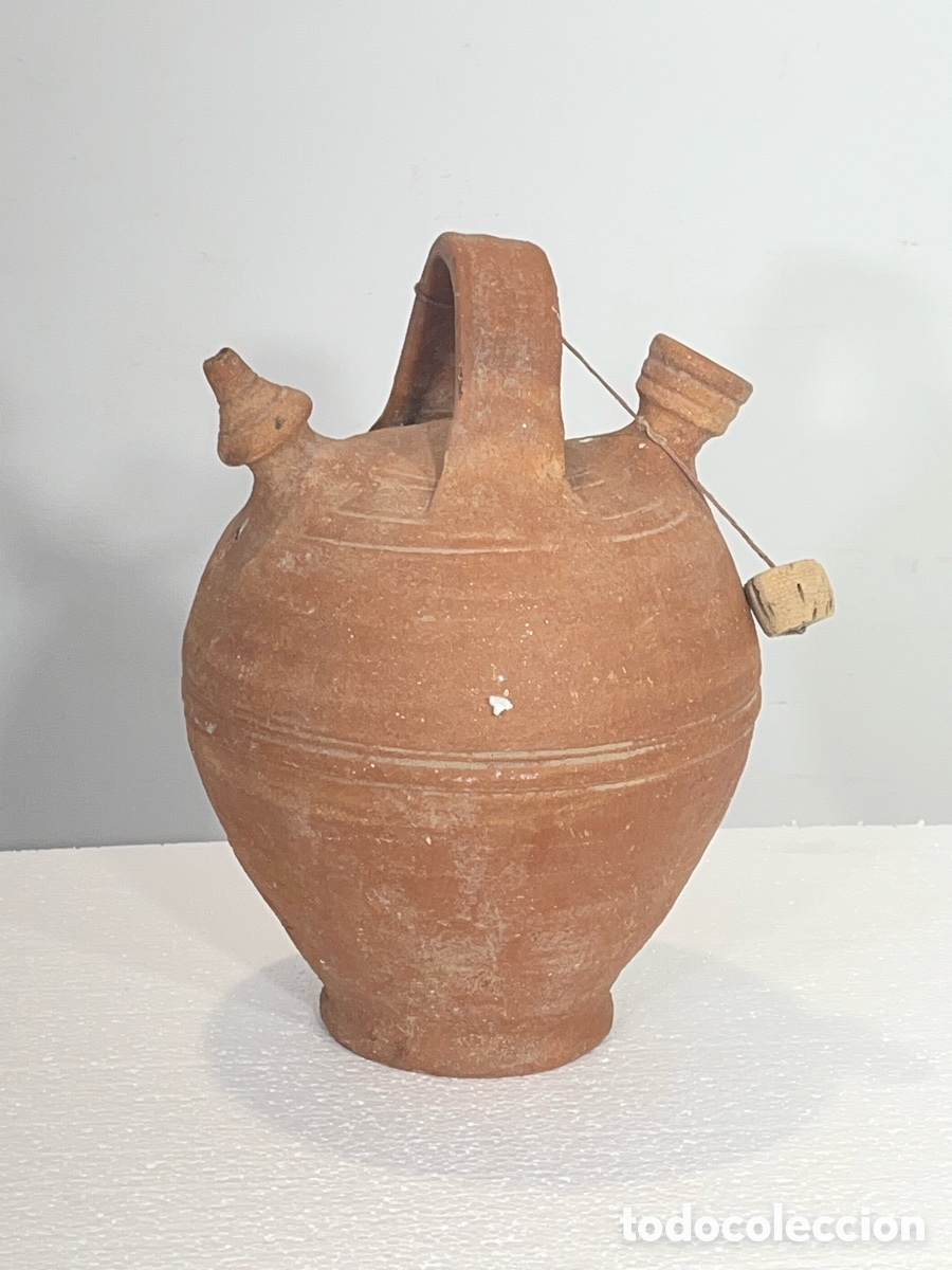 Antig&uuml;edades: Antiguo botijo de barro. M1