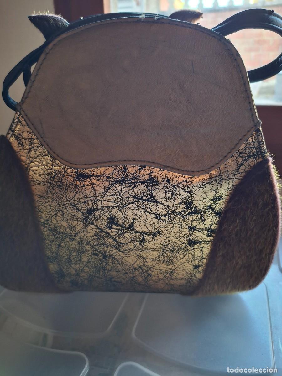 Antig&uuml;edades: Bolso bhuo dorado antiguos