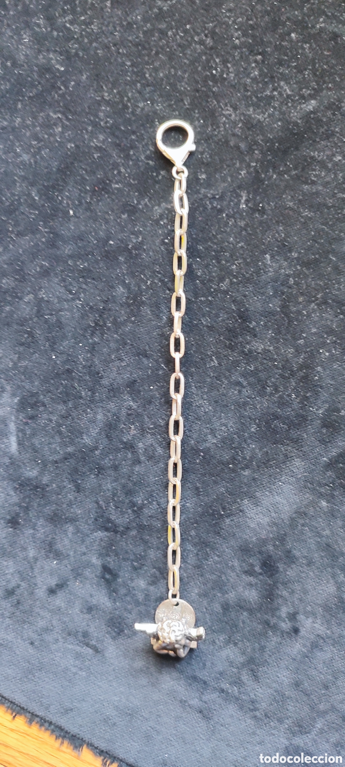 Antig&uuml;edades: Colgante en plata de ley con la figura de un &aacute;ngel con contrastes