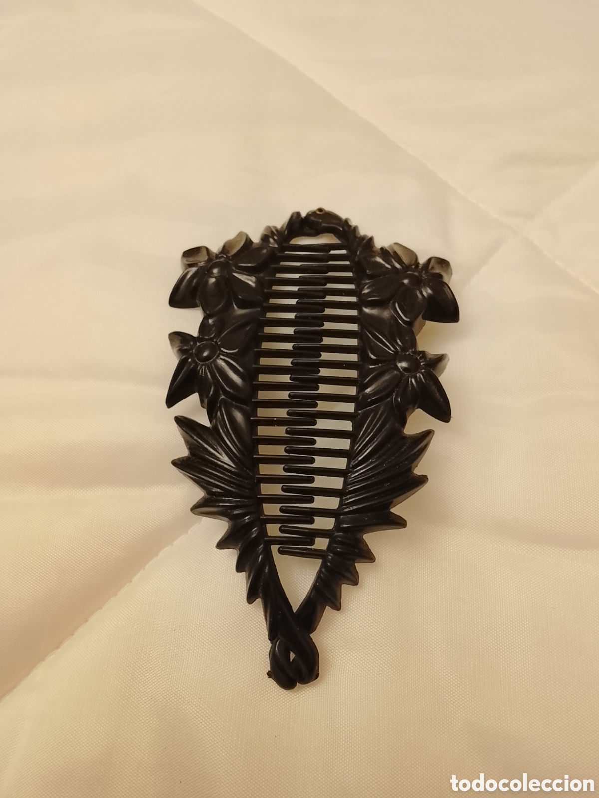 Antig&uuml;edades: Peineta tibur&oacute;n recoge pelo .A&ntilde;os 70