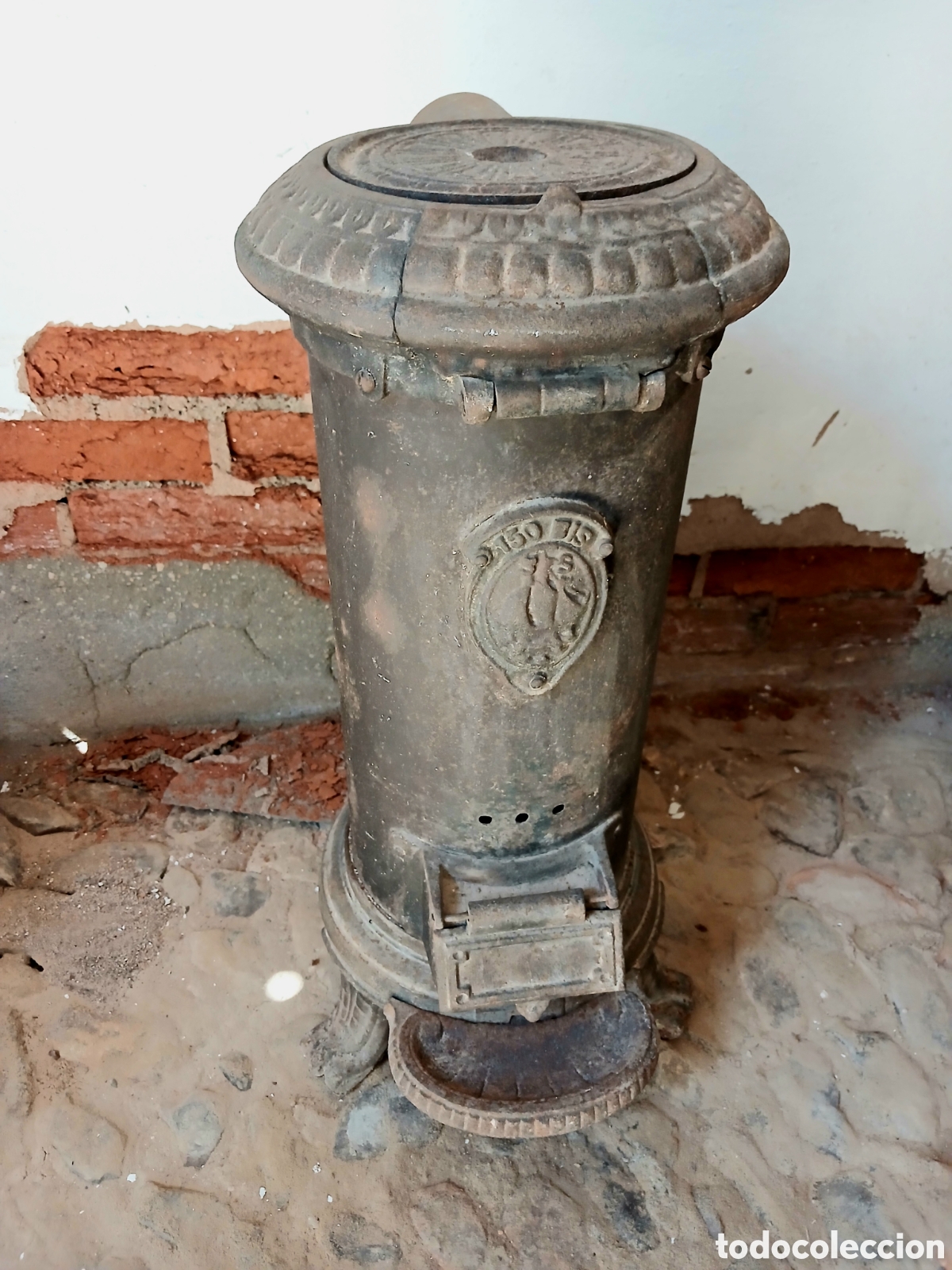 Antig&uuml;edades: Estufa de hierro fundido antigua