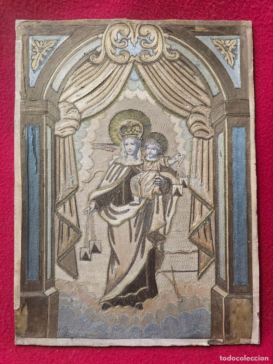 Antig&uuml;edades: Cuadro religioso realizado de hilo pegado sobre carton.