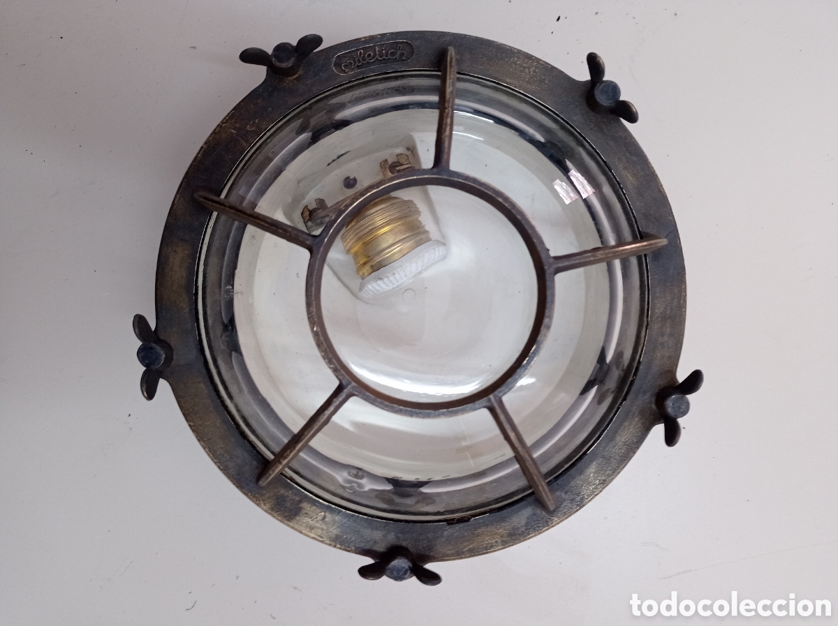 Antig&uuml;edades: Ojo de buey antiguo de bronce