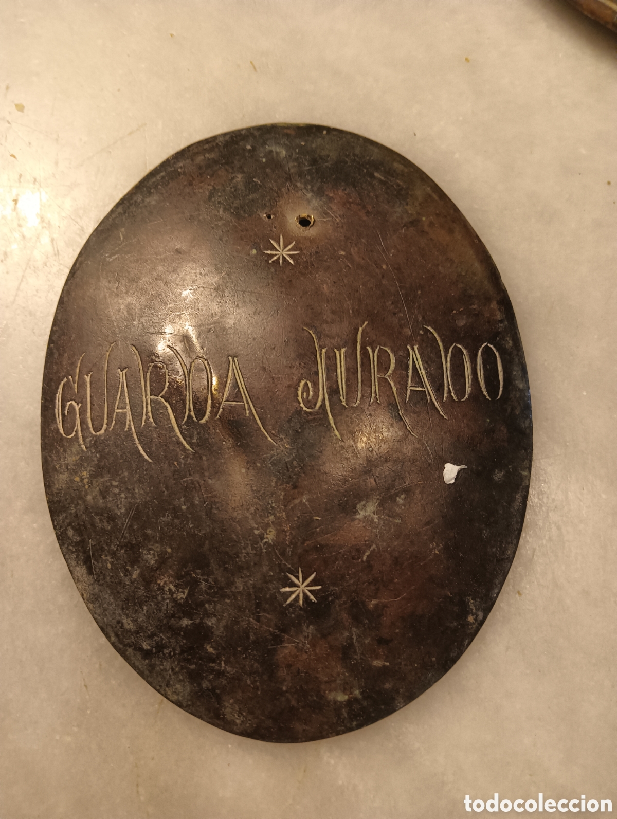 Antig&uuml;edades: Placa de guarda jurado antigua