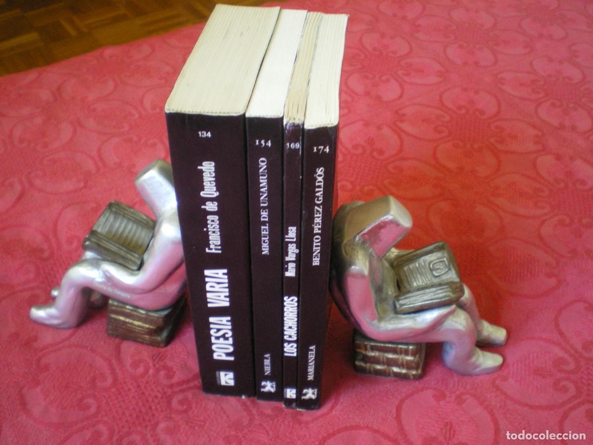 Antig&uuml;edades: PAREJA DE SUJETALIBOS. LECTORES. ART 3.