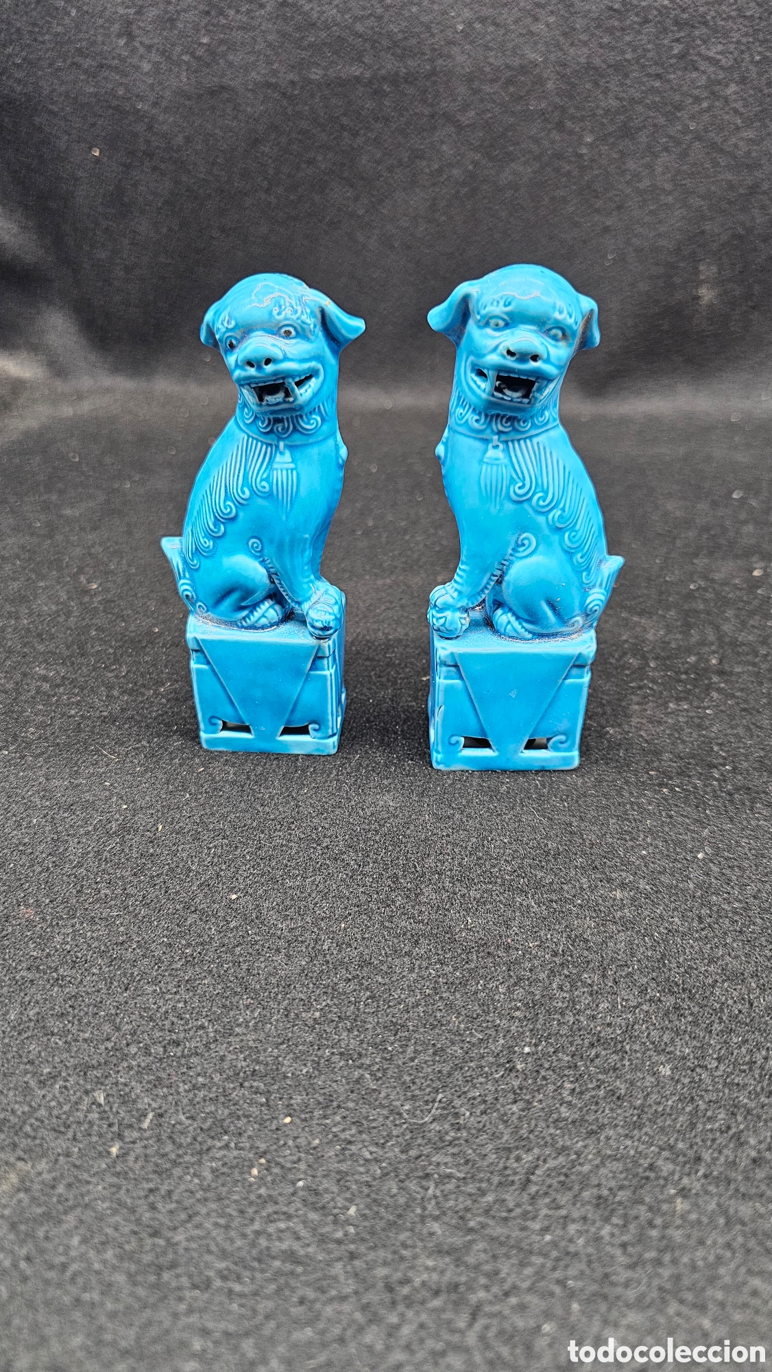 Antig&uuml;edades: Pareja de leones / perros foo de porcelana