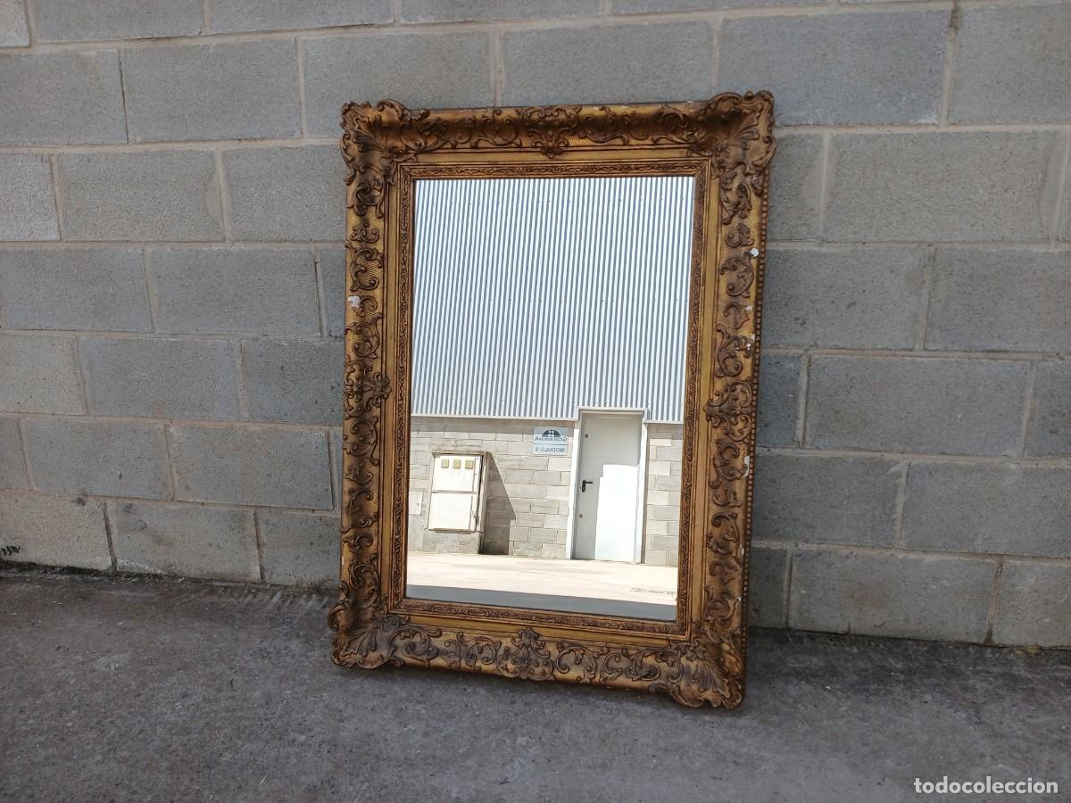 Antig&uuml;edades: Espejo antiguo dorado.