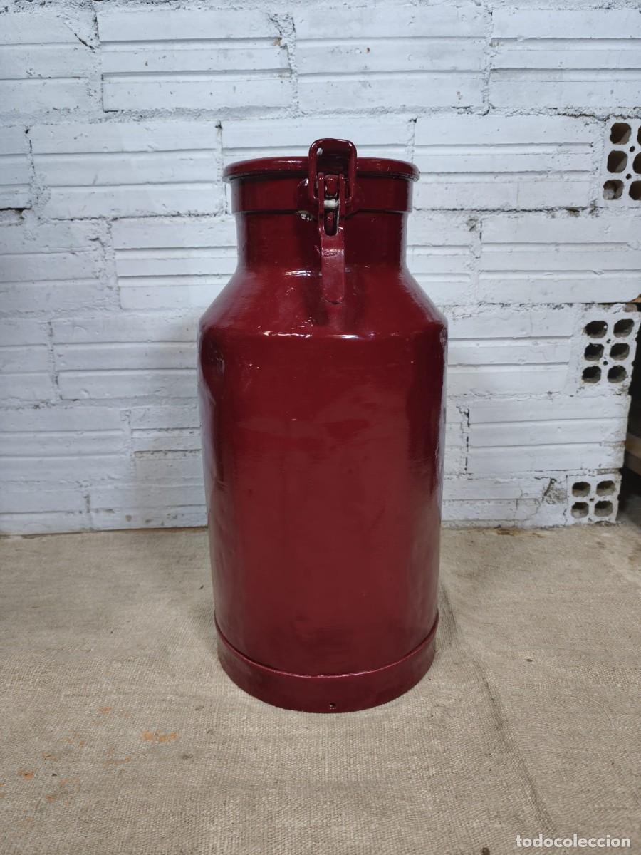 Antig&uuml;edades: Lechera de hierro antigua