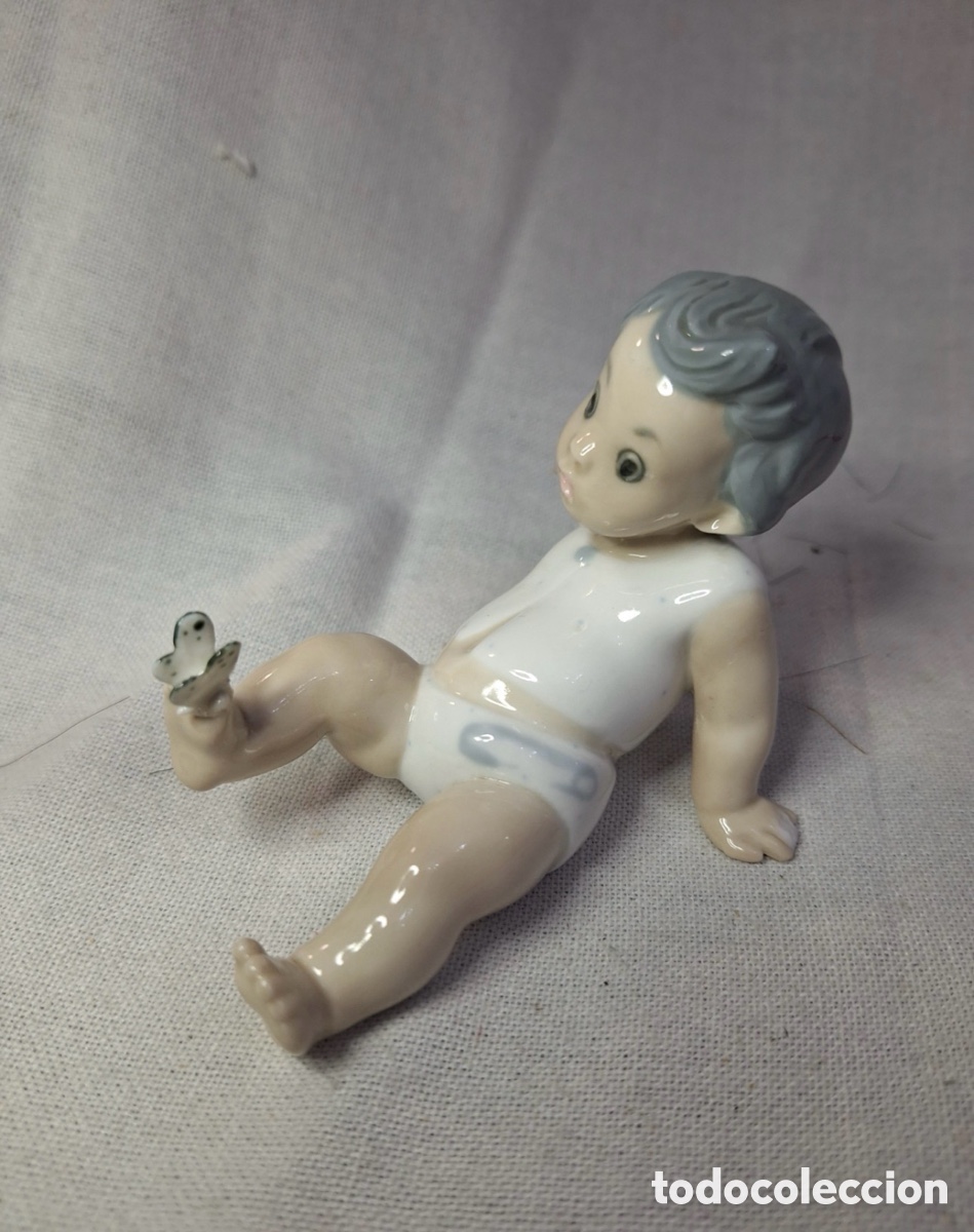 Antig&uuml;edades: REF: 010000048.03 &ldquo;BEB&Eacute; CON MARIPOSA&rdquo; LLADR&Oacute;