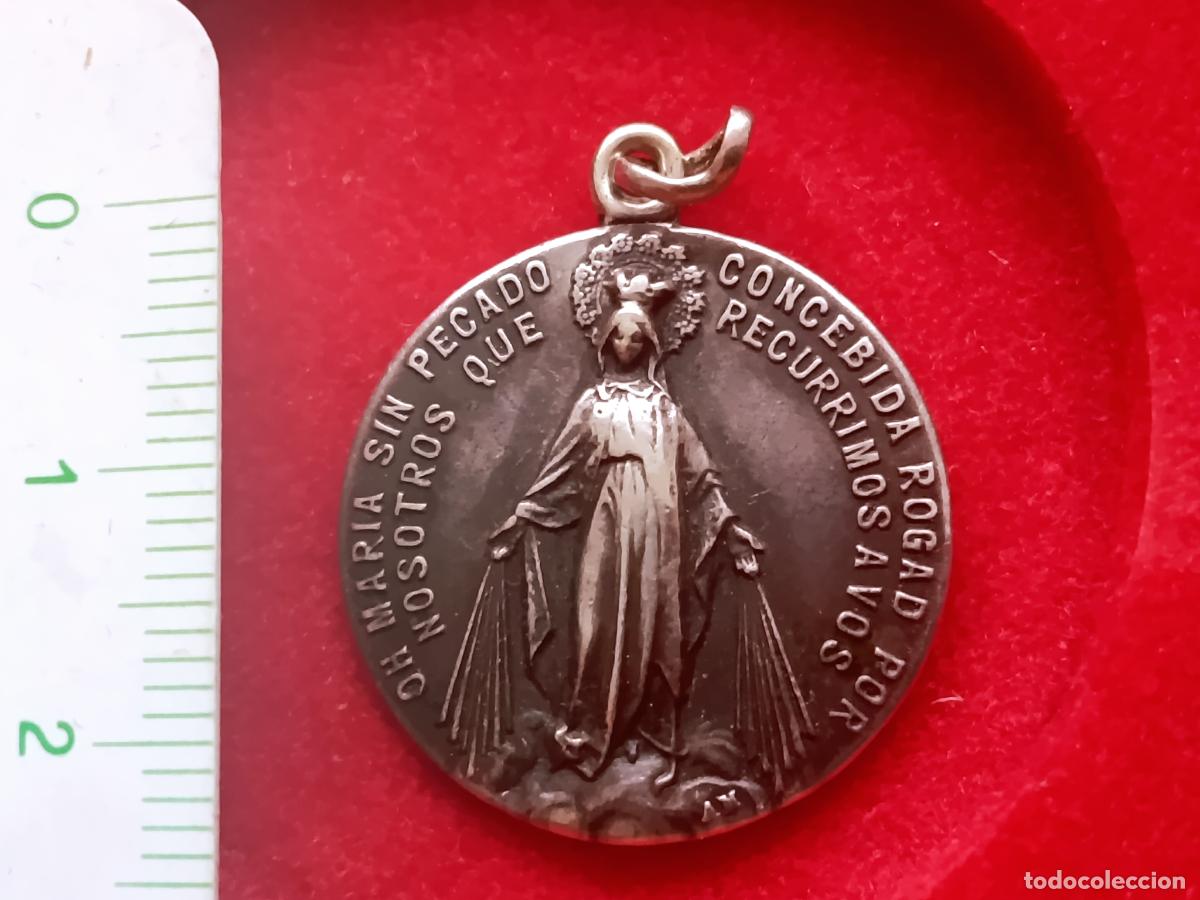 Antig&uuml;edades: Medalla antigua de plata