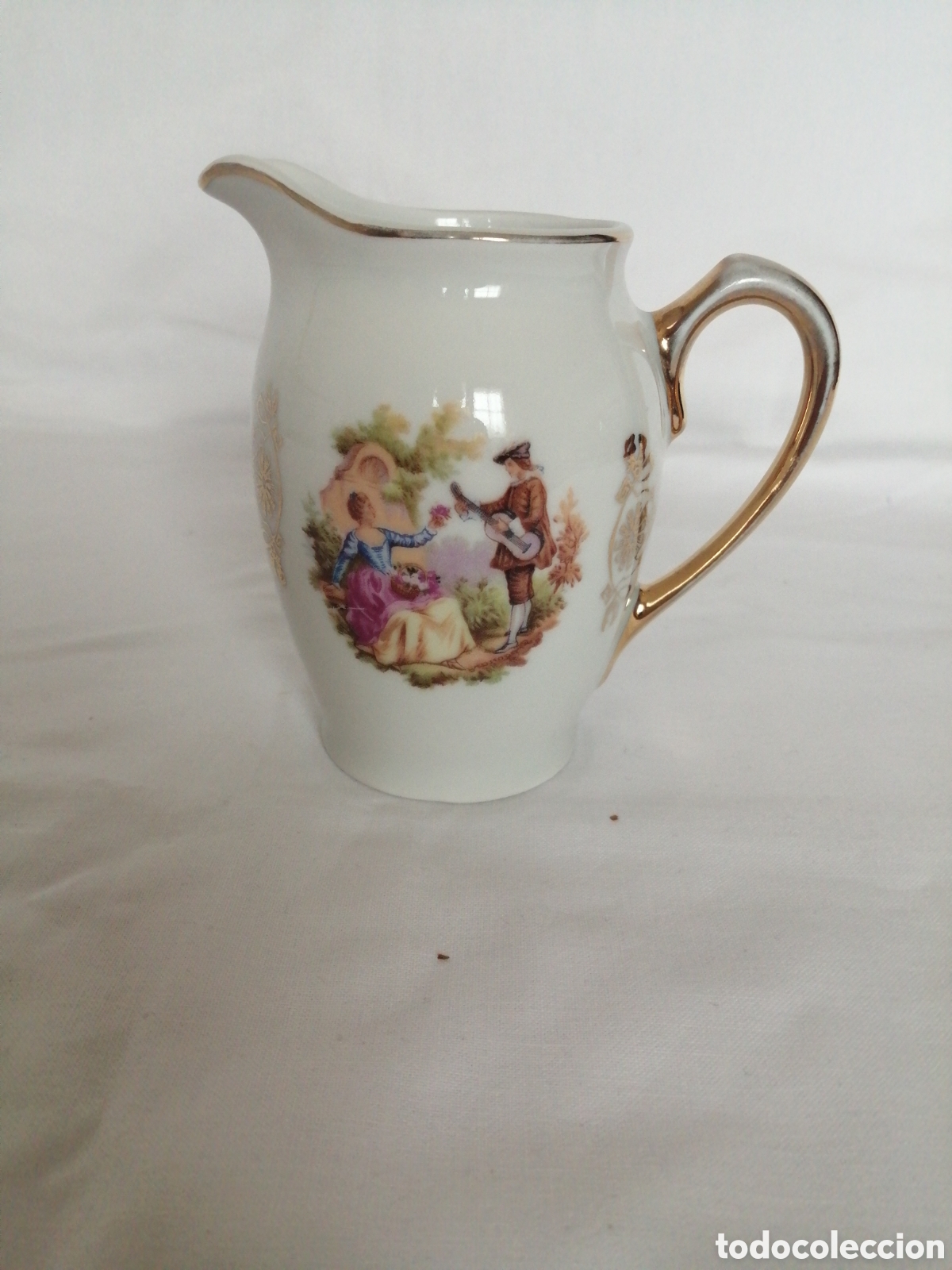 Antig&uuml;edades: Jarra lechera porcelana Santa Clara.