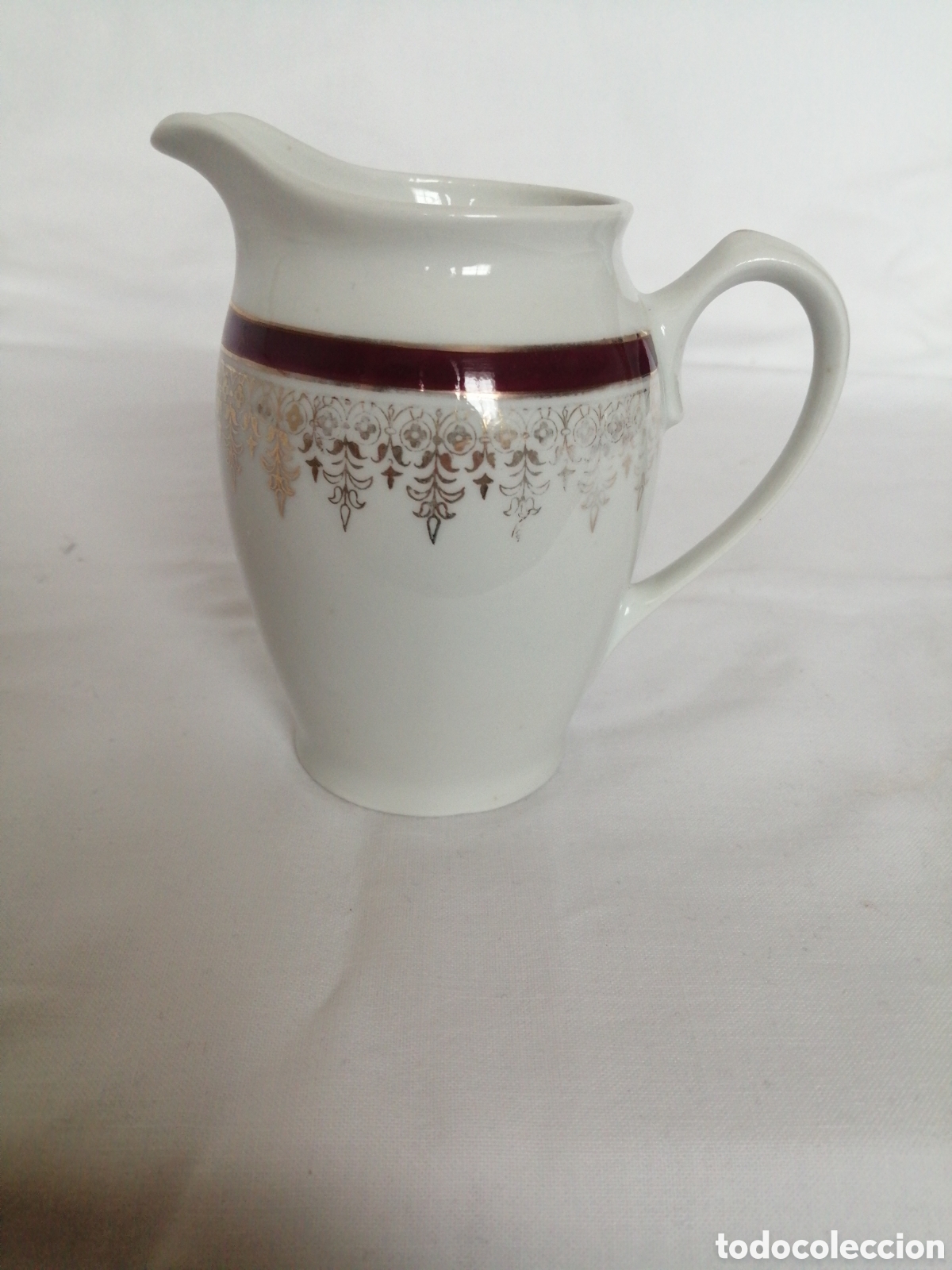 Antig&uuml;edades: Jarra lechera porcelana Santa Clara.