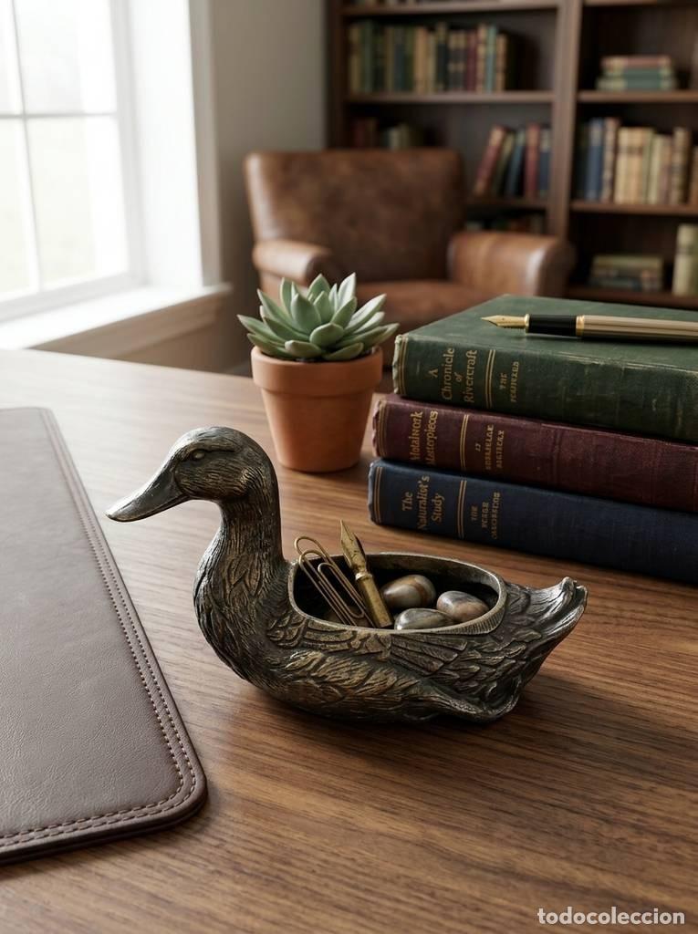 Antig&uuml;edades: ESCULTURA DE PATO DE BRONCE