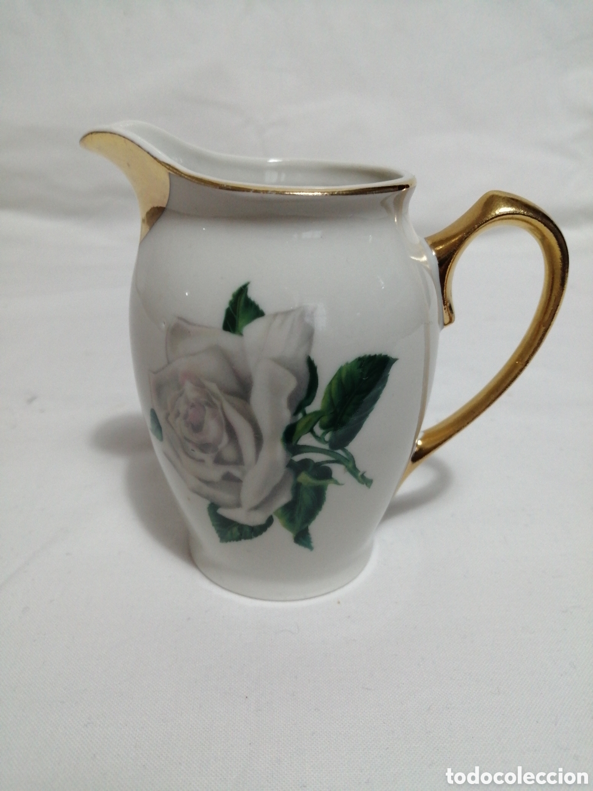 Antig&uuml;edades: Jarra lechera porcelana Santa Clara.