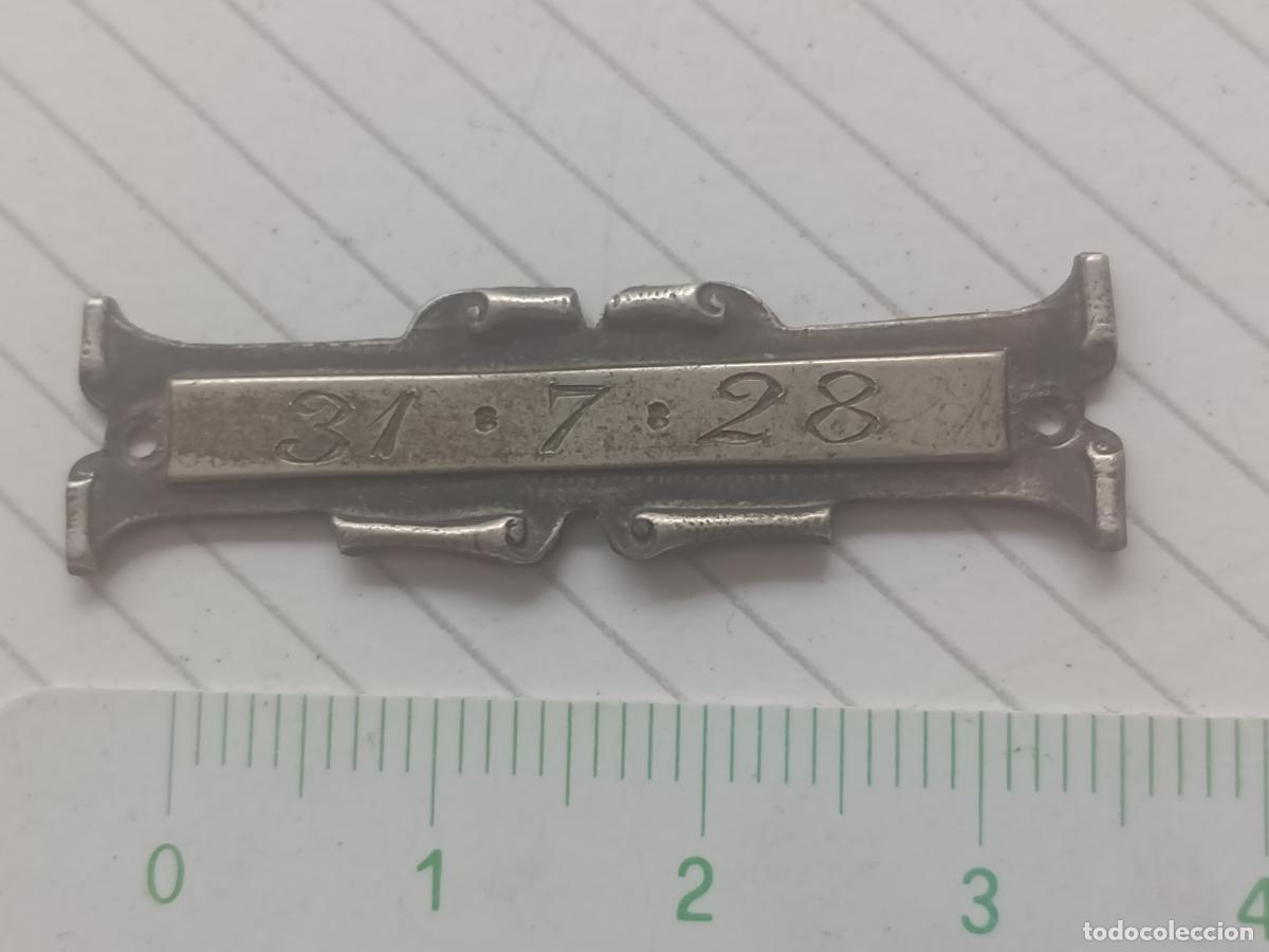 Antig&uuml;edades: Plaquita antigua. 1928