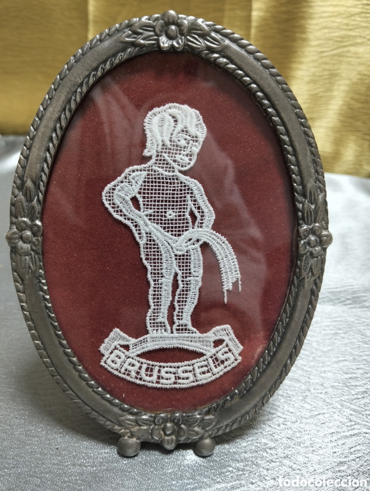 Antig&uuml;edades: &nbsp;recuerdo decorativo&nbsp;que presenta una figura de encaje del&nbsp;Manneken Pis,(&nbsp;15 cm aprox)