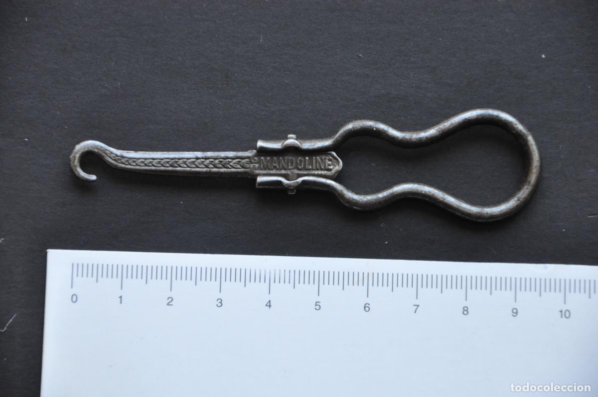 Antig&uuml;edades: ABROCHADOR DE CALZADO MARCA MANDOLINE