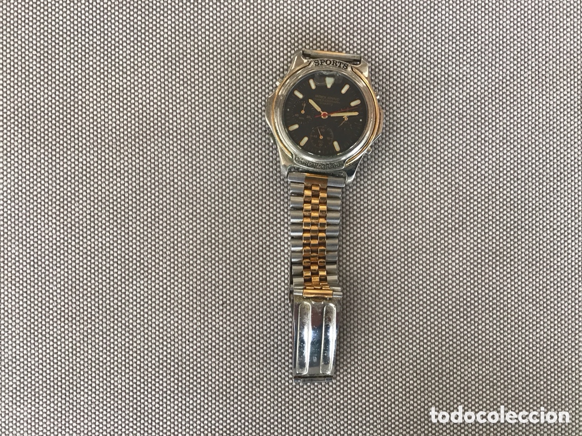 Antig&uuml;edades: Reloj Patrick Arnaud con cron&oacute;grafo vintage en tonos plateado y dorado