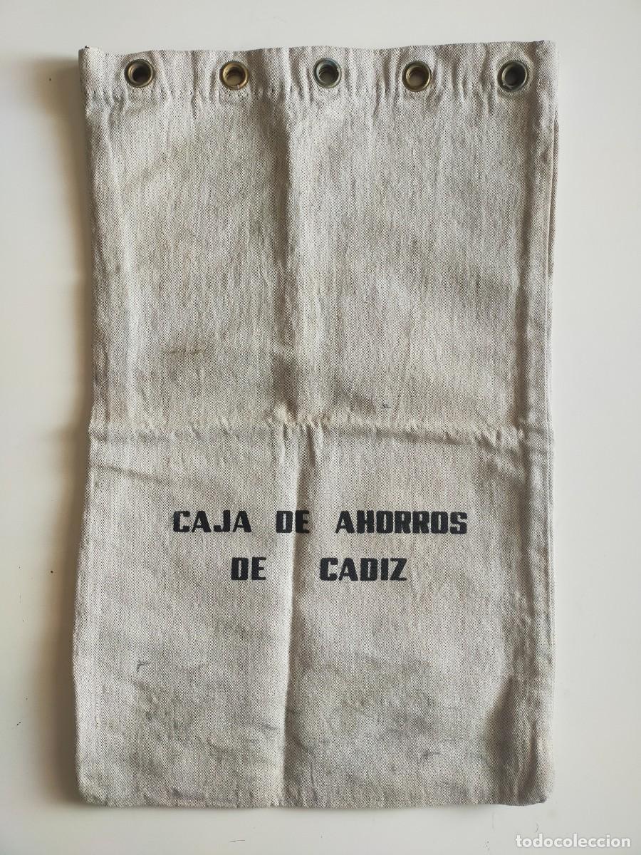 Antig&uuml;edades: Antigua Saca o Bolsa de Dinero: CAJA DE AHORROS DE CADIZ - A&ntilde;os 60