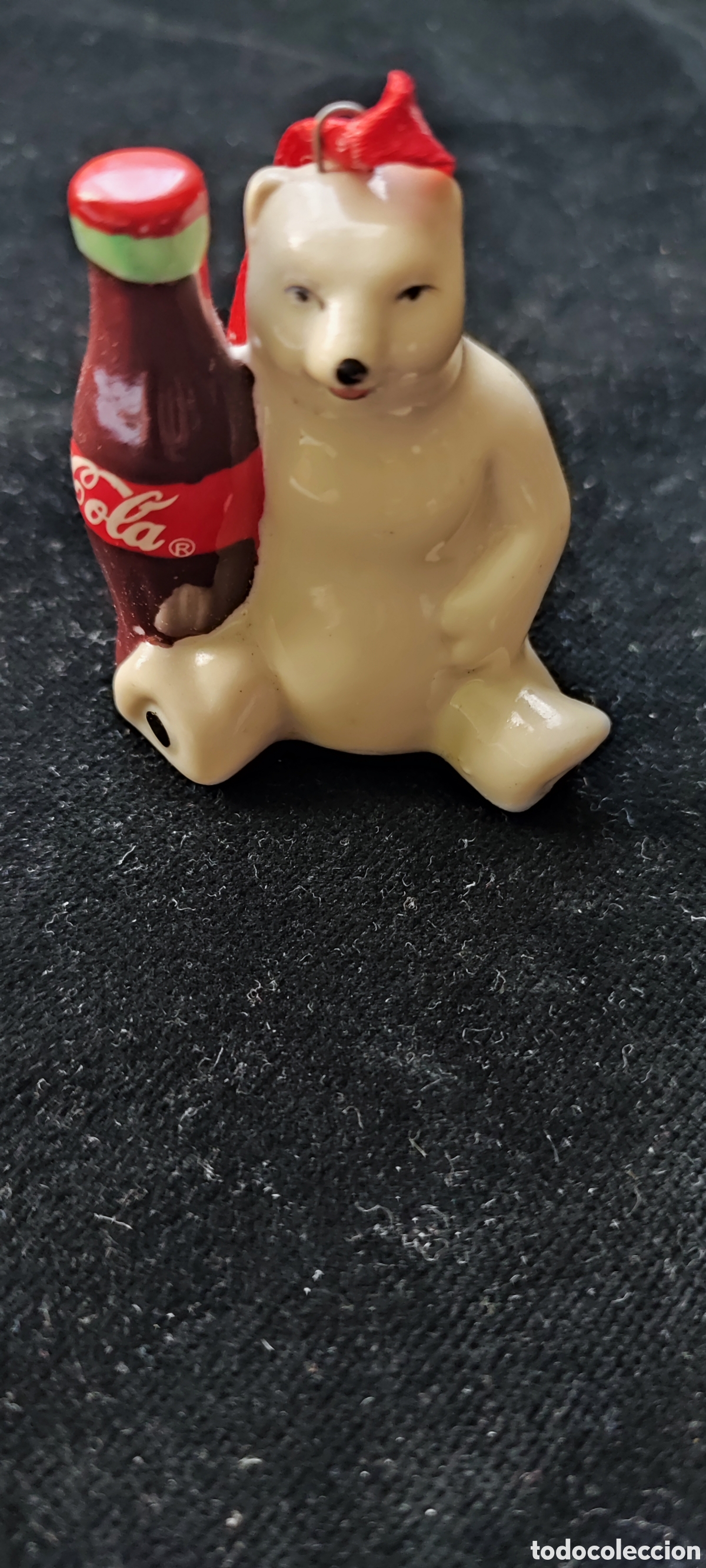 Antig&uuml;edades: Antigua figura publicitaria de Coca Cola