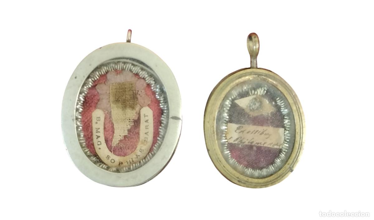 Antig&uuml;edades: PAREJA DE ANTIGUOS RELICARIOS DE PLATA Y METAL. MAG. SOPHIAE BARAT / PHILOMENAE. FRANCIA (?). XIX